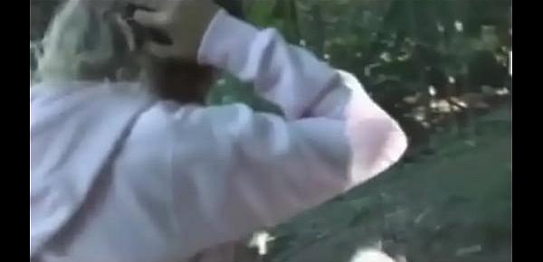  Cute teens make sextape perched precariously in the woods